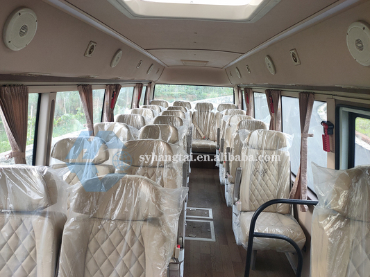 7m Coaster Buses การต้อนรับผู้โดยสารการขนส่งผู้โดยสาร 22 ที่นั่งรถยนต์ไฟฟ้าแบตเตอรี่